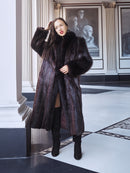 Woman wearing a fur coat in an elegant interior setting