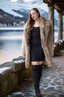 Mid-length raccoon fur coat, relaxed fit, V-neck open front, side profile