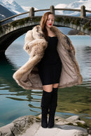 Raccoon fur coat with oversized sleeves, open front showing a black mini dress