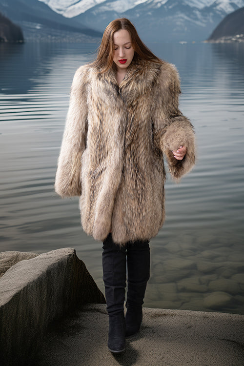 Golden honey raccoon fur coat with deep textured pile, long sleeves and V neckline