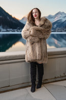 Golden honey raccoon fur coat with chestnut tones, wide collar and long sleeves
