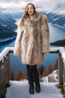 Raccoon fur coat in golden honey with chestnut highlights, stand collar and straight cut