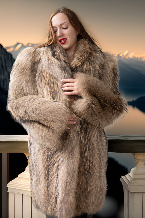 Close-up of golden honey raccoon fur coat with thick lapel and plush shoulder texture
