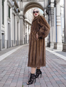Elegant vintage Canadian brown mink fur coat, silk-lined, stylish woman posing in city street