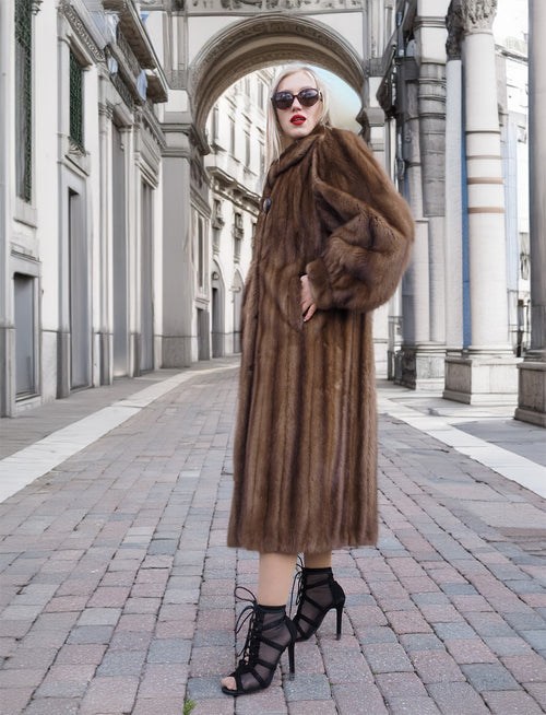 Elegant vintage Canadian brown mink fur coat, silk-lined, stylish woman posing in city street