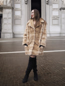 Modern blond pastel mink fur coat stroller jacket worn open, perfect for upscale winter fashion and sustainable fur lovers.