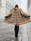 Back view of wide-swinging blond pastel mink fur coat stroller jacket, emphasizing its luxurious volume and vintage charm.
