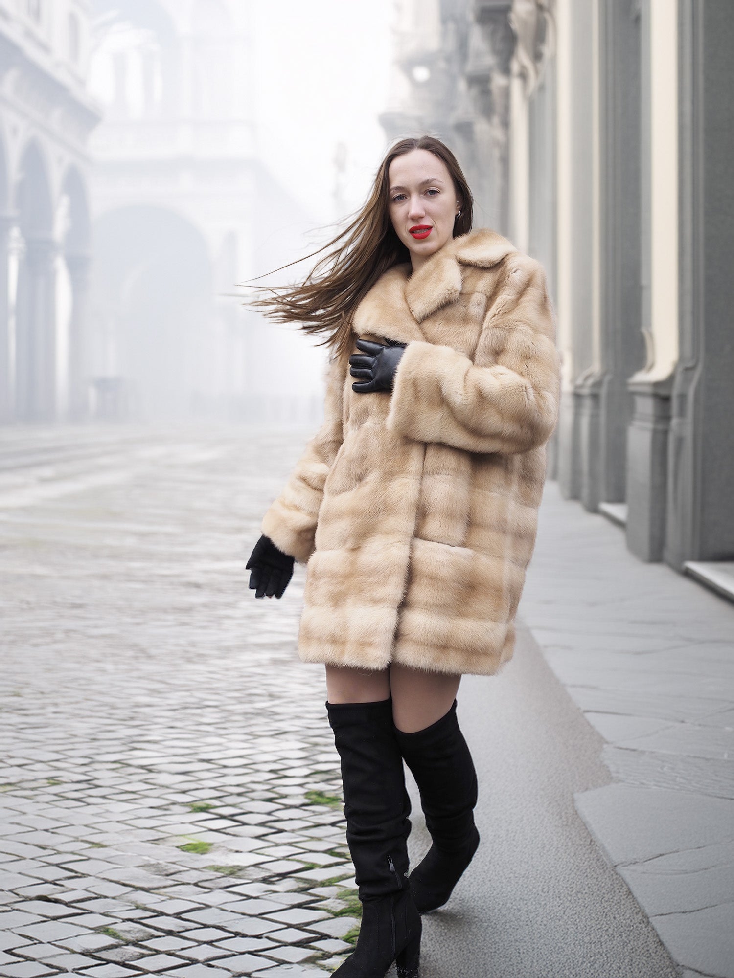 Blond pastel mink fur coat stroller jacket styled for city fashion, combining warmth and luxury in a timeless outerwear piece.