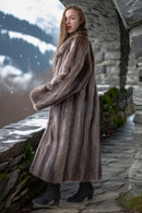 Gray-brown raccoon fur long coat, side profile with double-breasted button closures