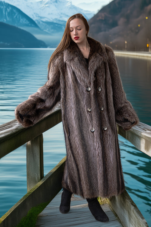 Gray-brown raccoon fur coat with double-breasted front, rounded collar, and metal buttons