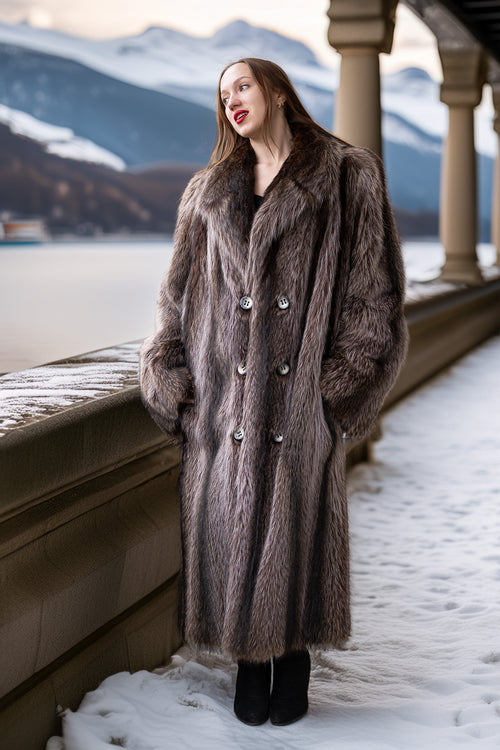 Long raccoon fur double-breasted coat with notched lapels and silver button front