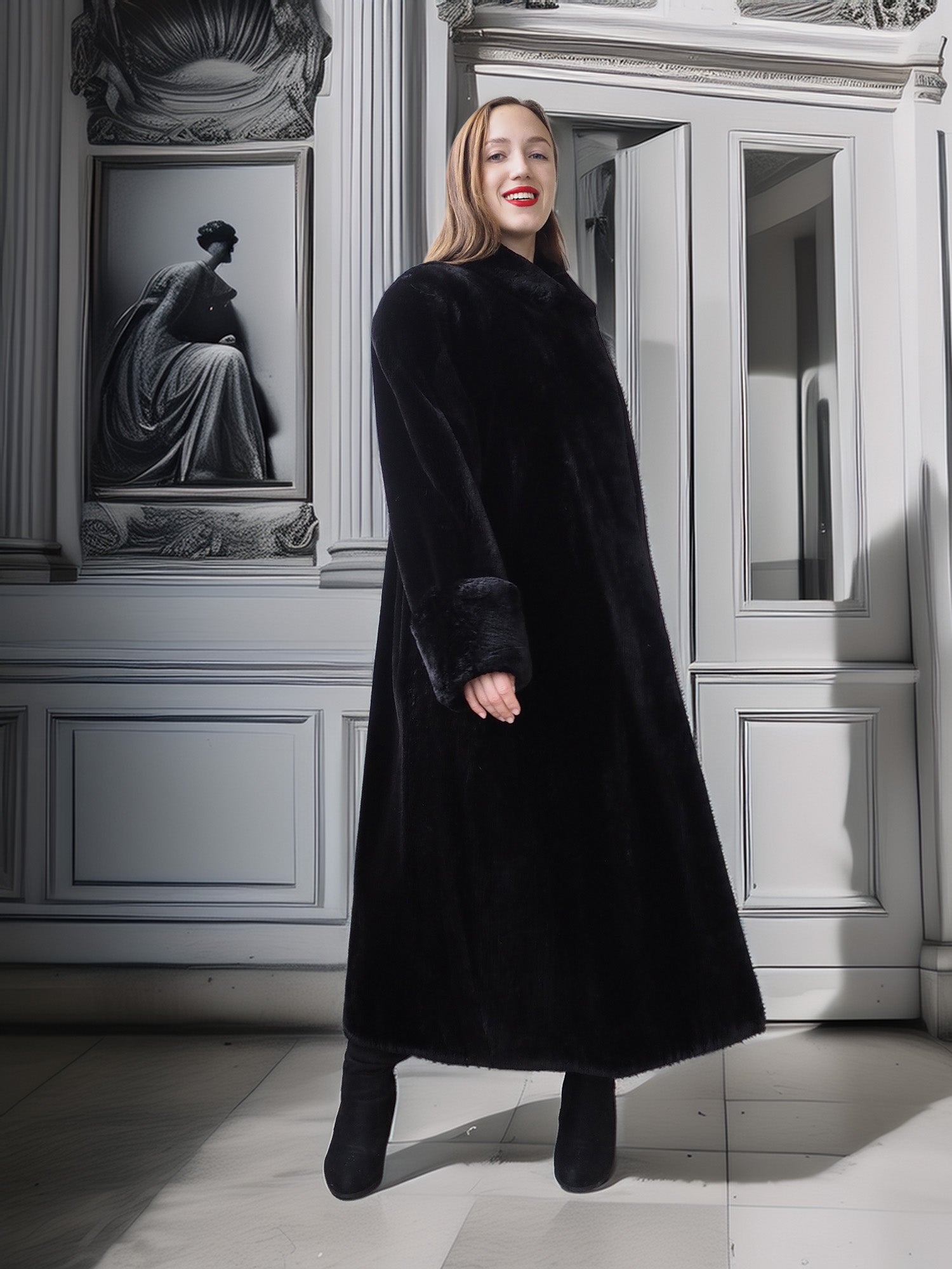 Woman wearing a long black coat in an elegant interior setting