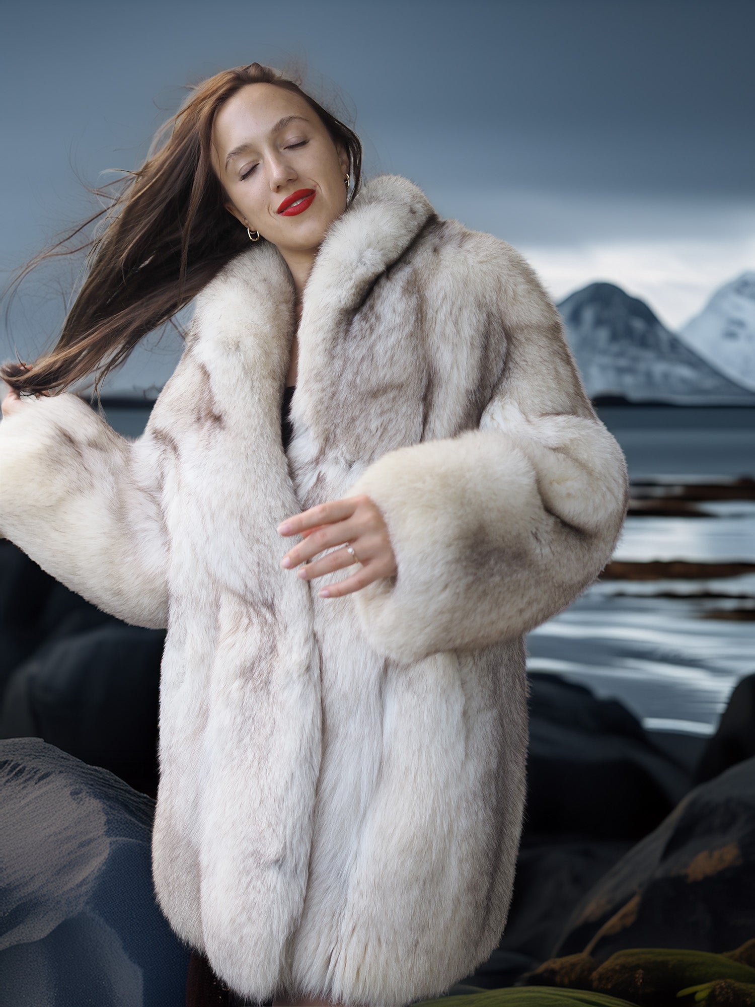 Woman wearing a fur coat with a snowy mountain landscape in the background
