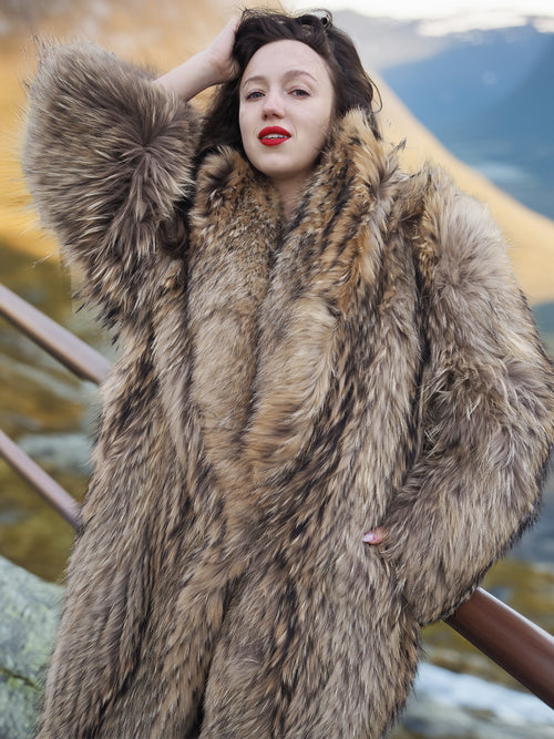 Close-up of Finnish Raccoon Fur Coat highlighting rich texture and voluminous collar, perfect for cold-weather luxury wear.