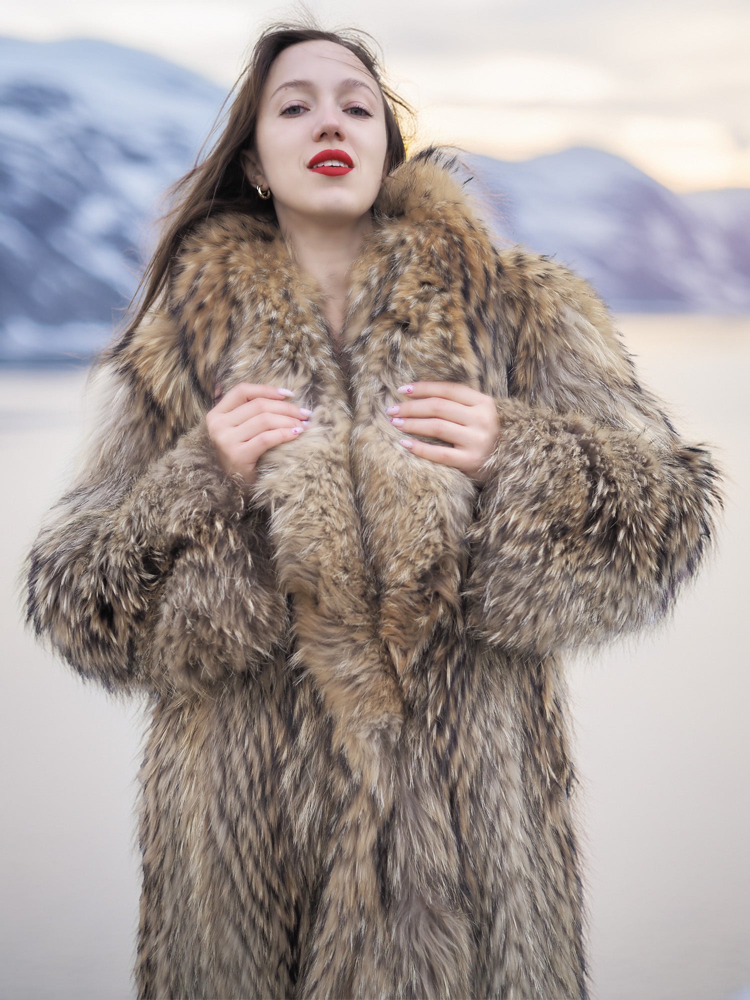 Close-up of Finnish Raccoon Fur Coat with rich brown fur and large collar, showcasing luxurious texture and sustainable winter fashion.