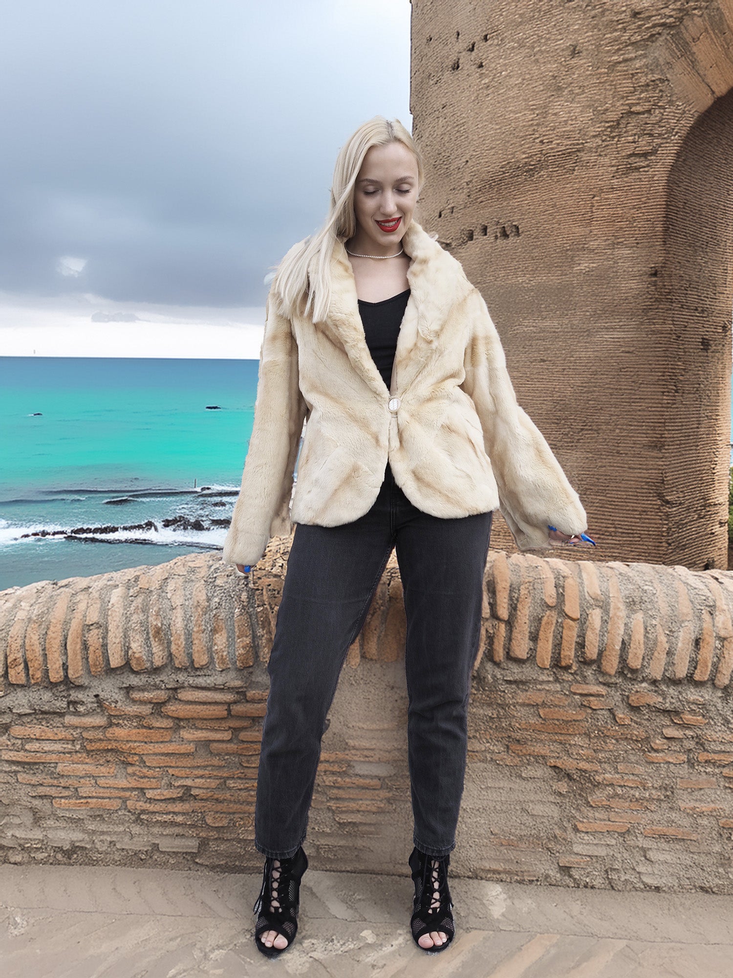 Reversible Versatile Sheared Mink Fur Jacket Coat S in natural mink fur, worn with black heels, styled on a scenic coastal terrace.