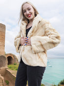 Reversible Versatile Sheared Mink Fur Jacket Coat S in plush mink fur, buttoned at front, modeled near ancient stone architecture.