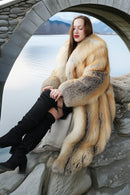 Golden island fox fur coat, long full-volume silhouette with gray fur cuffs at hem