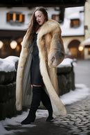 Full fox fur coat with shaggy striped sleeves and soft, voluminous drape