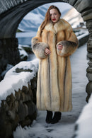 Golden fox fur coat front view with voluminous shoulders and gray fur cuffs