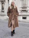 a woman in a fur coat and high heels