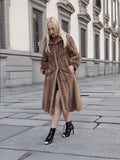 a woman in a fur coat and high heels