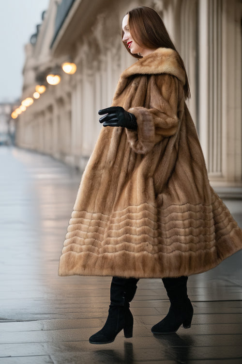 Tan mink coat with plush hood, full length, long sleeves, textured hem panel