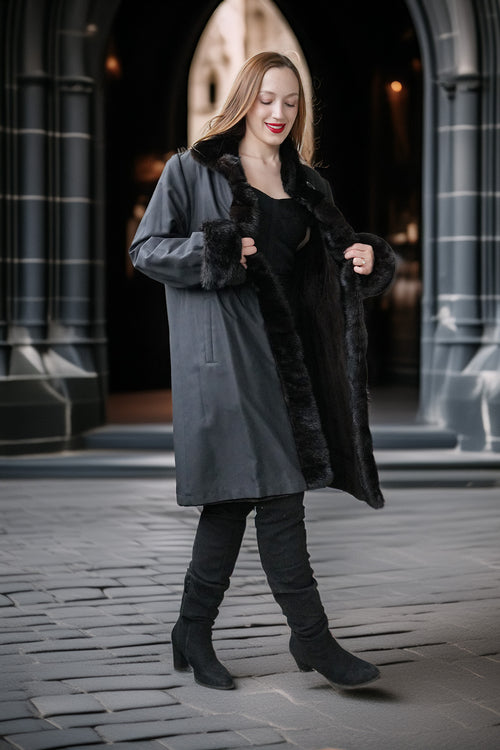 Dark mink coat with wide turn-back collar, button details, and short sleeves