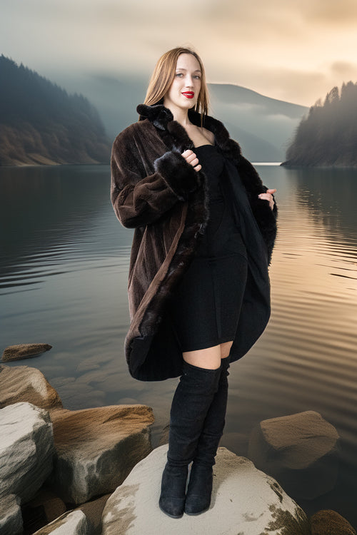Dark mink coat over a fitted dress, showing stand collar and button closure