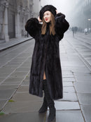 Dark ranch black mink fur coat with matching hat, styled for winter elegance. Ideal for luxury cold-weather outerwear collections.