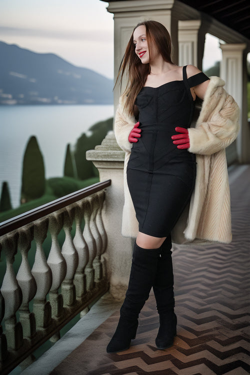 Ivory mink coat with plush fur cuffs and an open, collarless draped front.