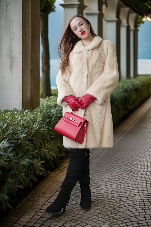 Ivory faux mink coat front view with thick collar, fitted waist, and button closure