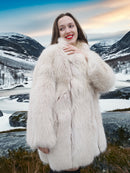 Soft Plush Blush Fox Jacket in S/M size styled in snowy mountain landscape, showcasing luxurious white fox fur and shawl collar design.