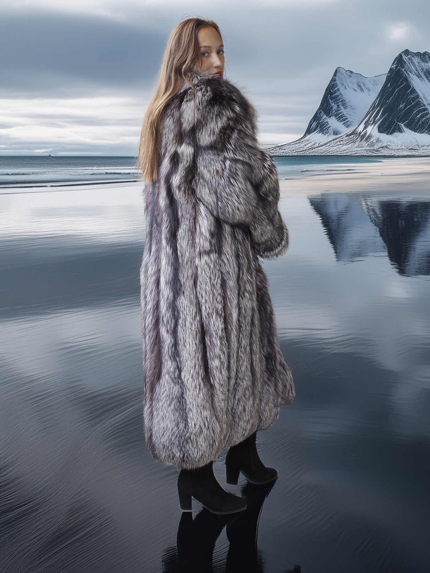 Person wearing a fur coat standing on a reflective surface with mountains in the background