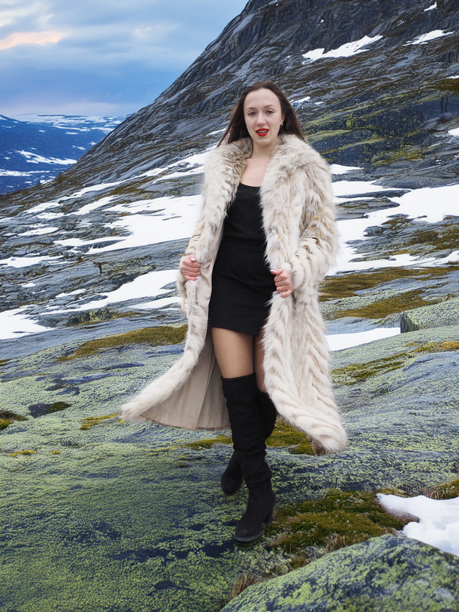 Two Tone Fox Coat Size XS/S styled over a black outfit in a snowy mountain setting, emphasizing luxury fur fashion and chevron design.