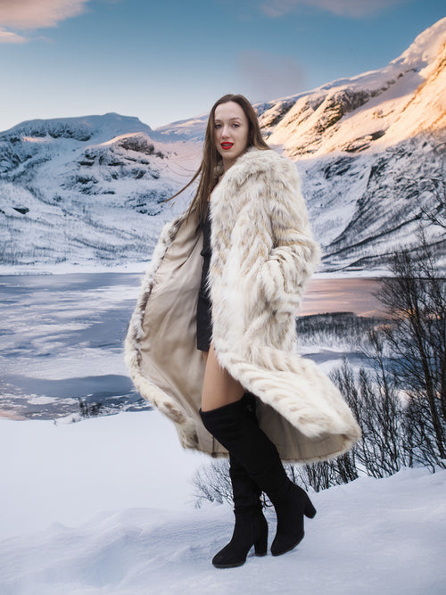Model wearing Two Tone Fox Coat Size XS/S with open front, revealing interior lining and chevron fur pattern, perfect for chic winter outerwear.