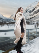 Two Tone Fox Coat Size XS/S worn open on a snowy balcony, revealing soft inner lining and chevron fur pattern for luxury winter style.