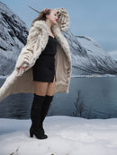 Two Tone Fox Coat Size XS/S worn open in a snowy mountain scene, showcasing the coat’s plush interior and chevron fur design.