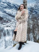 Two Tone Fox Coat with chevron pattern and oversized collar, styled in a snowy forest setting for luxurious winter outerwear appeal.