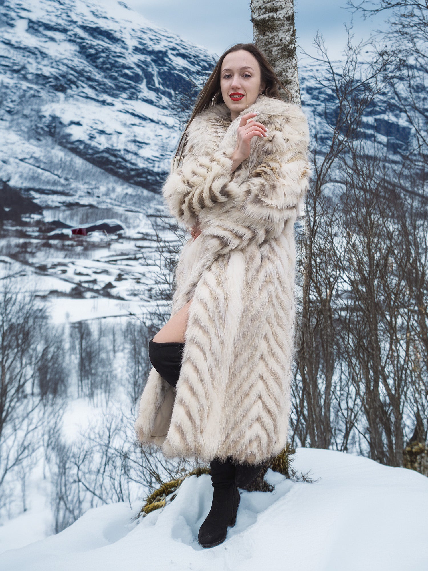 Two Tone Fox Coat with chevron pattern and oversized collar, styled in a snowy forest setting for luxurious winter outerwear appeal.