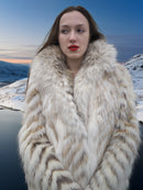 Close-up of model in Two Tone Fox Coat Size XS/S with thick shawl collar and chevron fur, ideal for upscale cold-weather fashion.