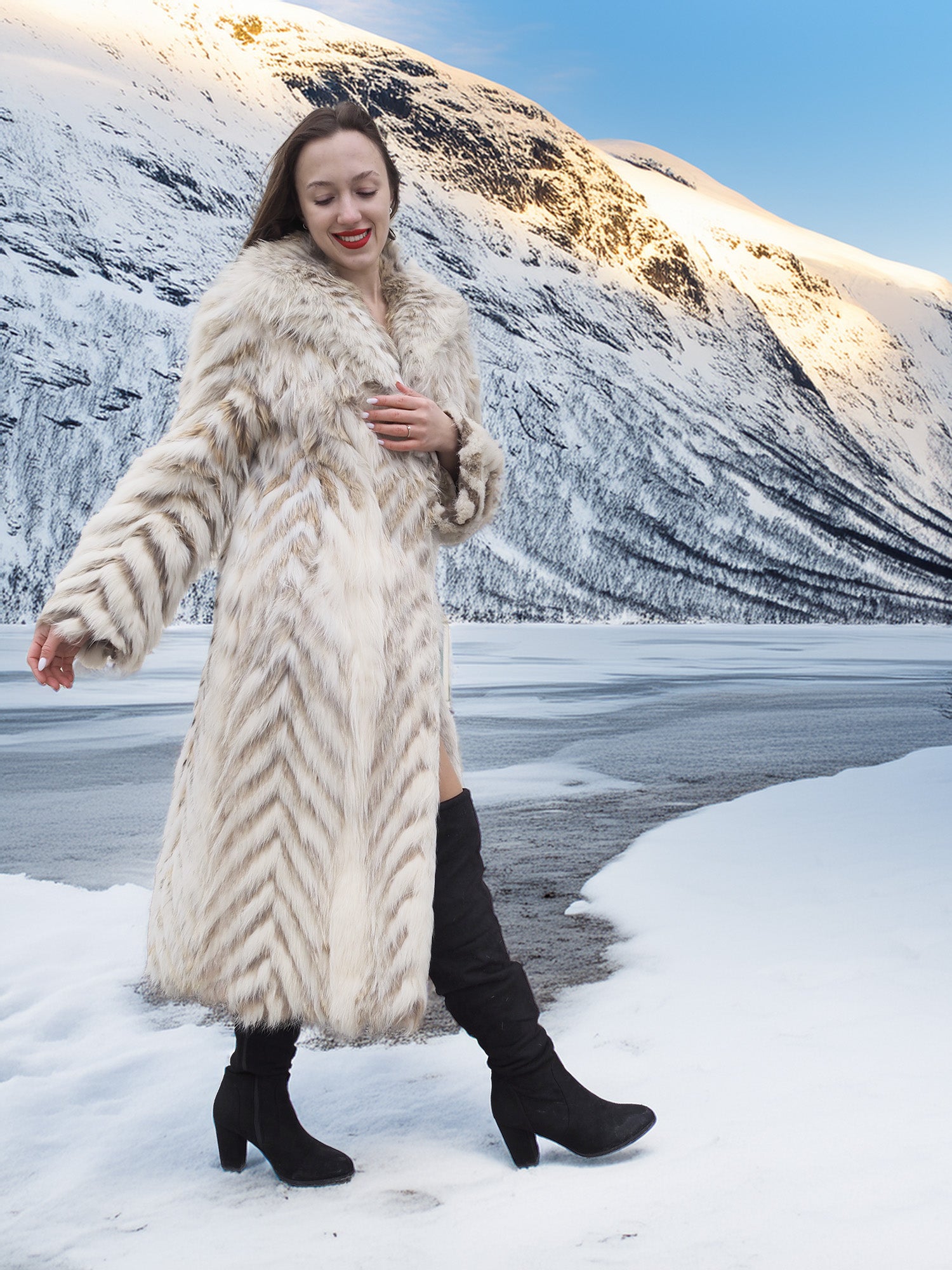 Two Tone Fox Coat Size XS/S styled in a snowy landscape, highlighting the coat’s chevron fur pattern and elegant silhouette.