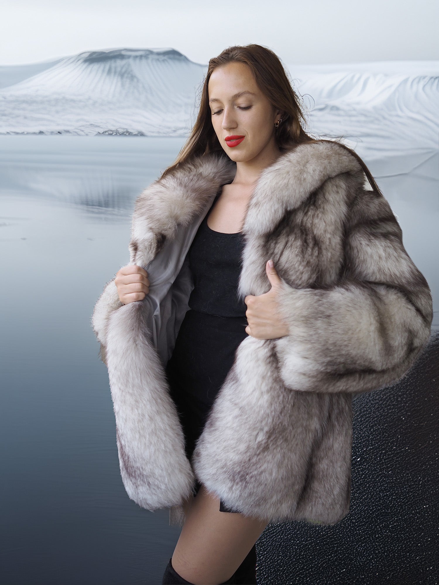 Woman wearing a fur coat with a scenic background