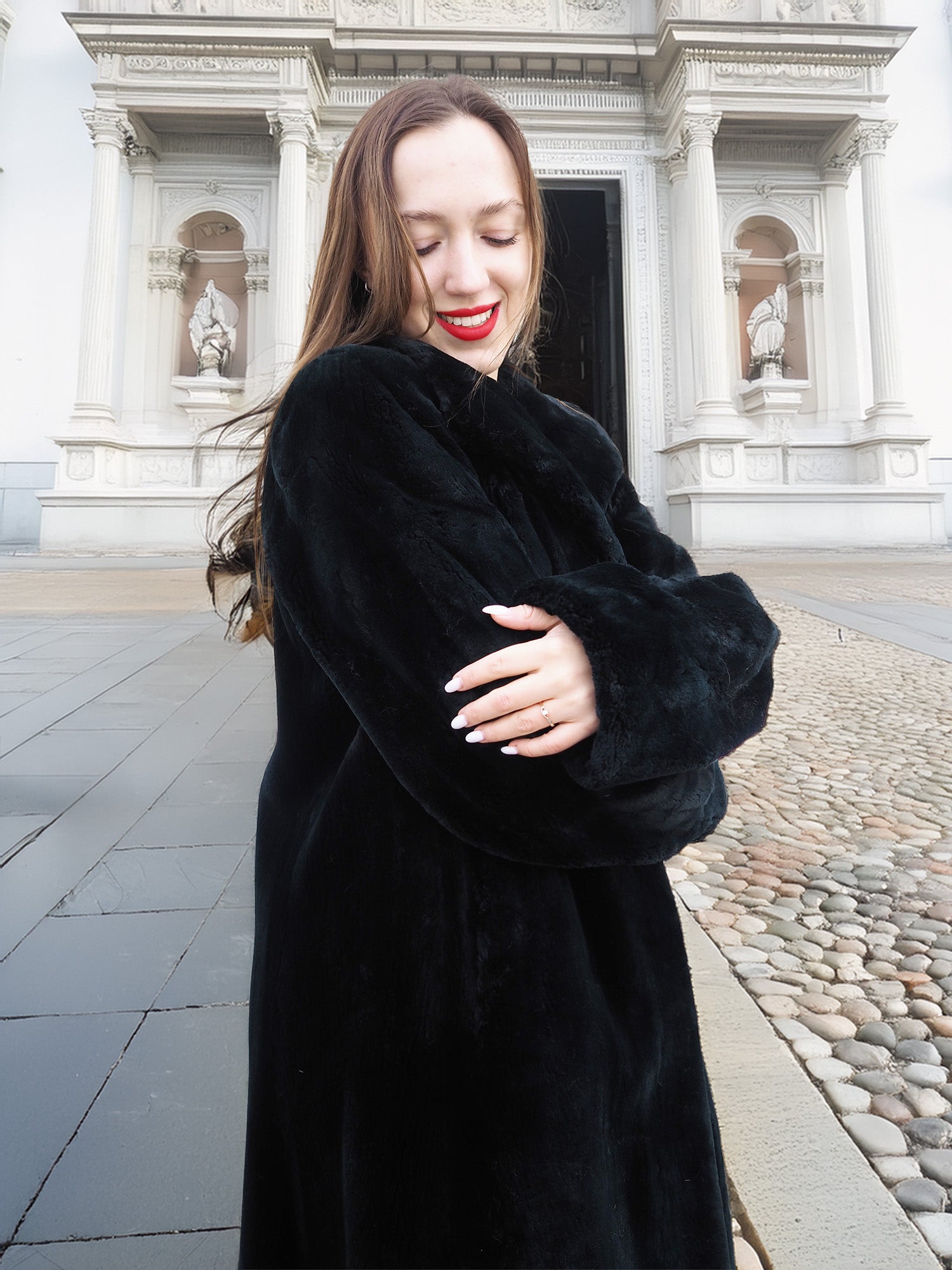 Model smiling in Sheard Deep Emerald Green Mink Fur Coat M Excellent, showcasing cozy sleeves and premium mink texture for winter elegance.