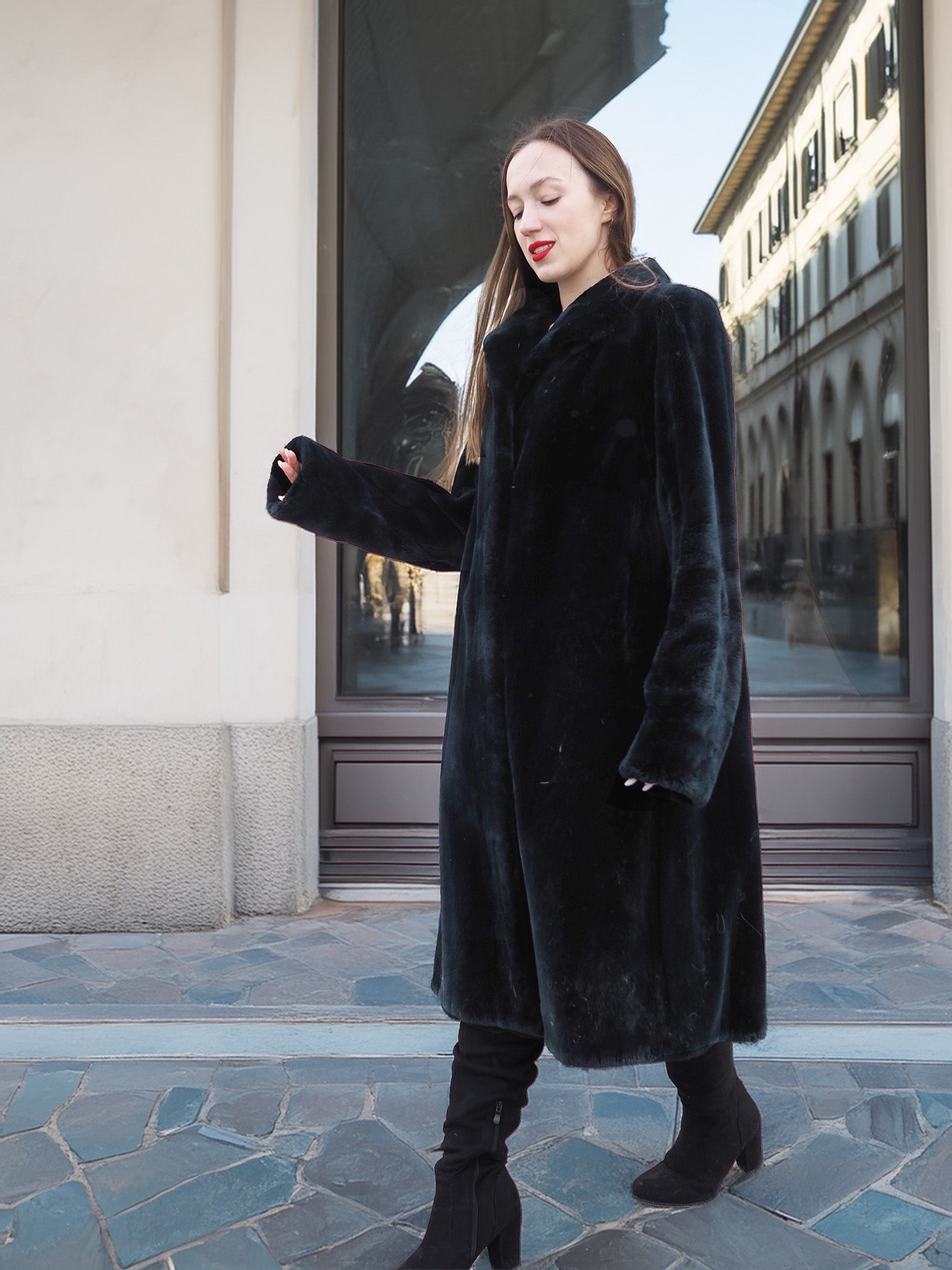 Walking shot of Sheard Deep Emerald Green Mink Fur Coat M Excellent, highlighting its rich texture and classic silhouette for luxury fur outerwear.