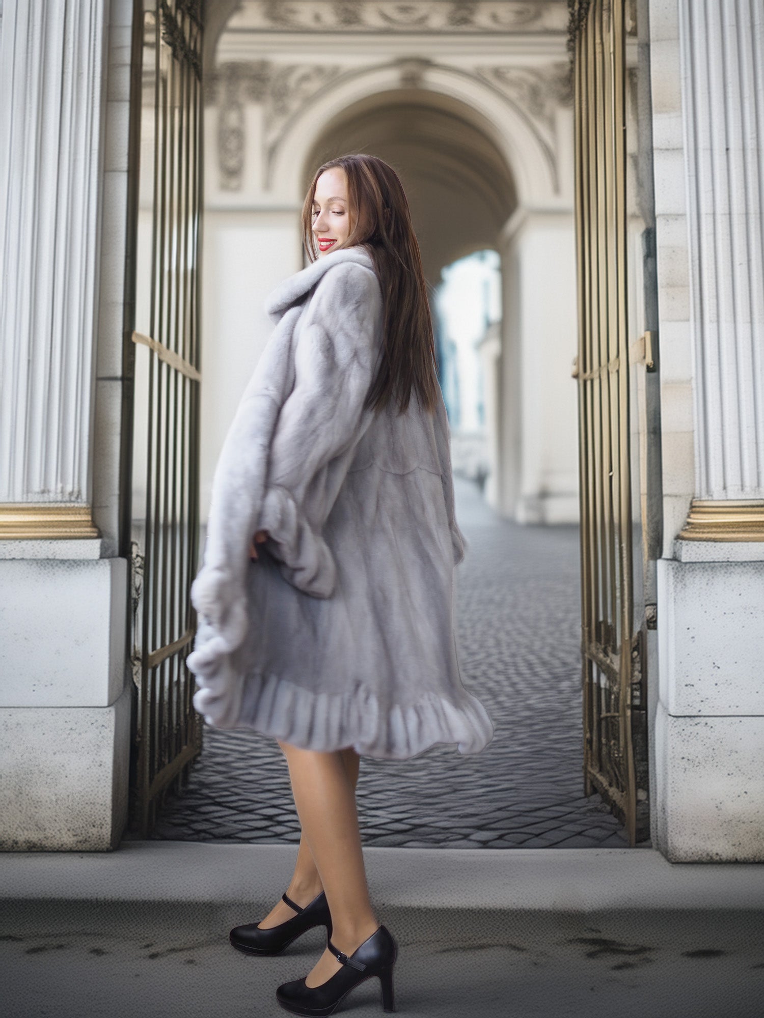 Woman wearing a fur coat standing in an elegant architectural setting