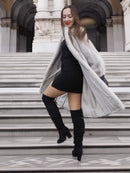 Model steps up stairs in Sapphire Grey Mink Fur Coat S Petit Excellent, revealing the coat’s silky interior and stylish movement.