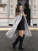 Model twirls in Sapphire Grey Mink Fur Coat S Petit Excellent over a black mini dress, highlighting the coat's luxurious lining and flow.