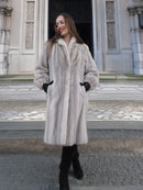 Sapphire Grey Mink Fur Coat S Petit Excellent styled with black gloves and boots, showcasing elegant winter fashion in a city backdrop.