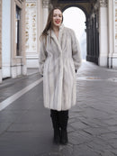 Front view of Sapphire Grey Mink Fur Coat S Petit Excellent, styled with black boots for a chic winter outerwear look.